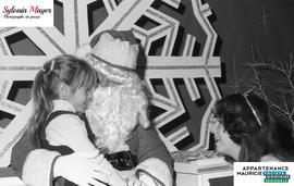 Enfant sur Père Noël