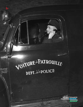 001 - Policier dans sa voiture